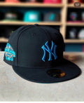 New Era 59FIFTY fitted hat features the New York Yankees logo in a vibrant teal blue embroidery against a black crown