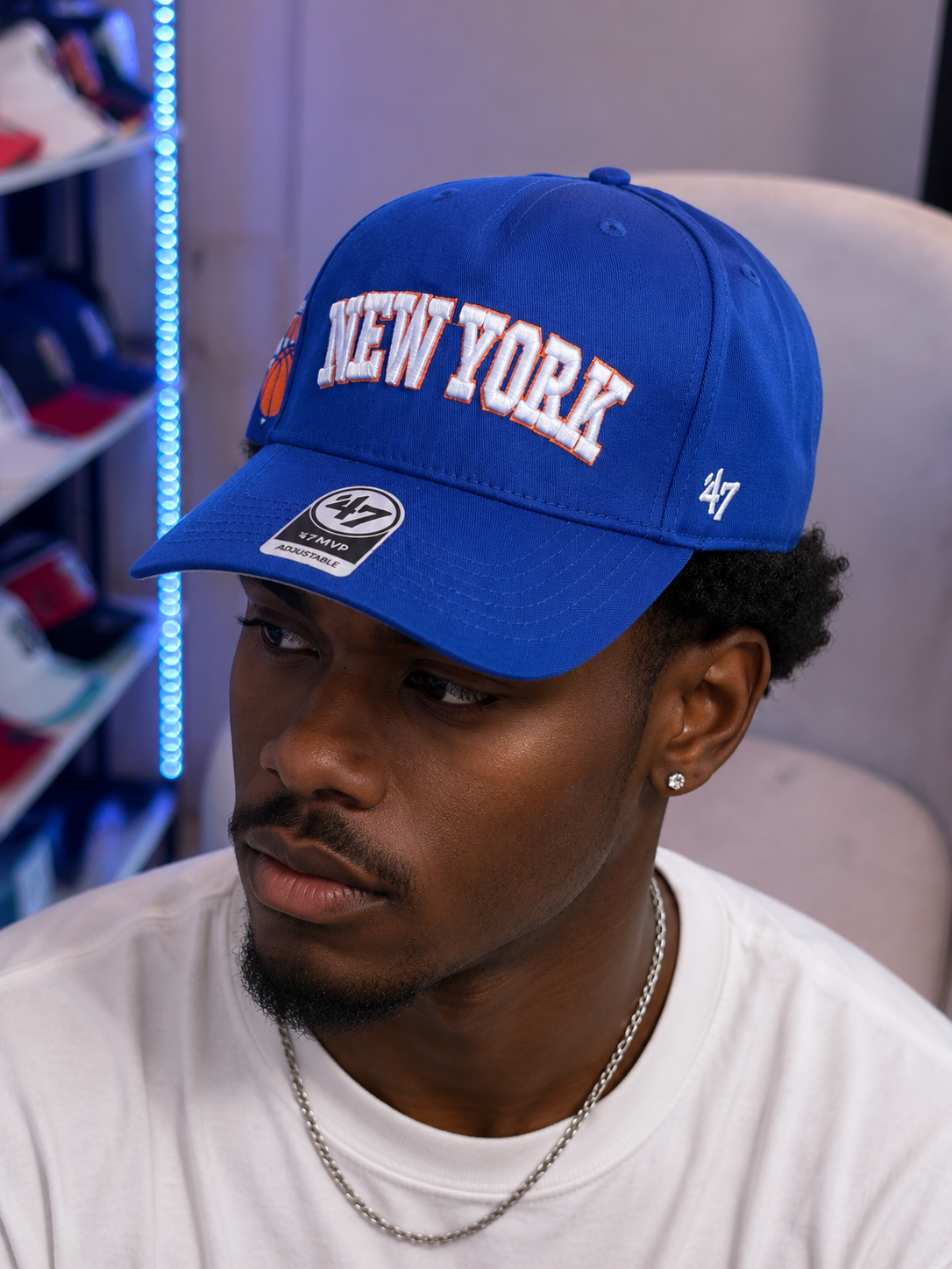 blue '47 Brand New York Knicks MVP adjustable hat features white and orange embroidery of the "New York" team name across the front.