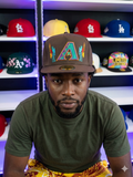 New Era Arizona Diamondbacks 59Fifty fitted hat features a vibrant embroidered teal and purple "A" logo on the front crown. ￼