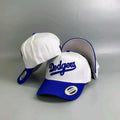 '47 Brand Hitch snapback hat features a white crown and blue script "Dodgers" embroidery.