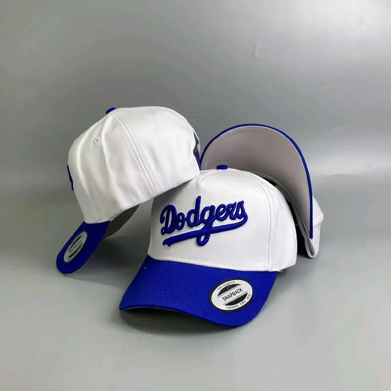 '47 Brand Hitch snapback hat features a white crown and blue script "Dodgers" embroidery.