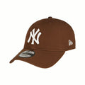 New Era 9Forty cap features a brown crown and a white New York Yankees logo.