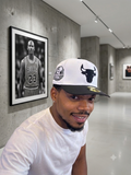 New Era 59FIFTY fitted hat featuring a black and white Chicago Bulls team logo.
