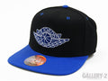 Jordan True AJ1 Retro Snapback hat in Game Royal and black with a classic embroidered "Wings" logo.