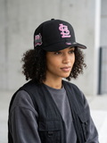 New Era St. Louis Cardinals 9FORTY A-Frame hat features a prominent pink embroidered logo on a black crown