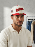 New Era 59FIFTY Los Angeles Dodgers fitted hat features an off-white crown with a red visor and script lettering.