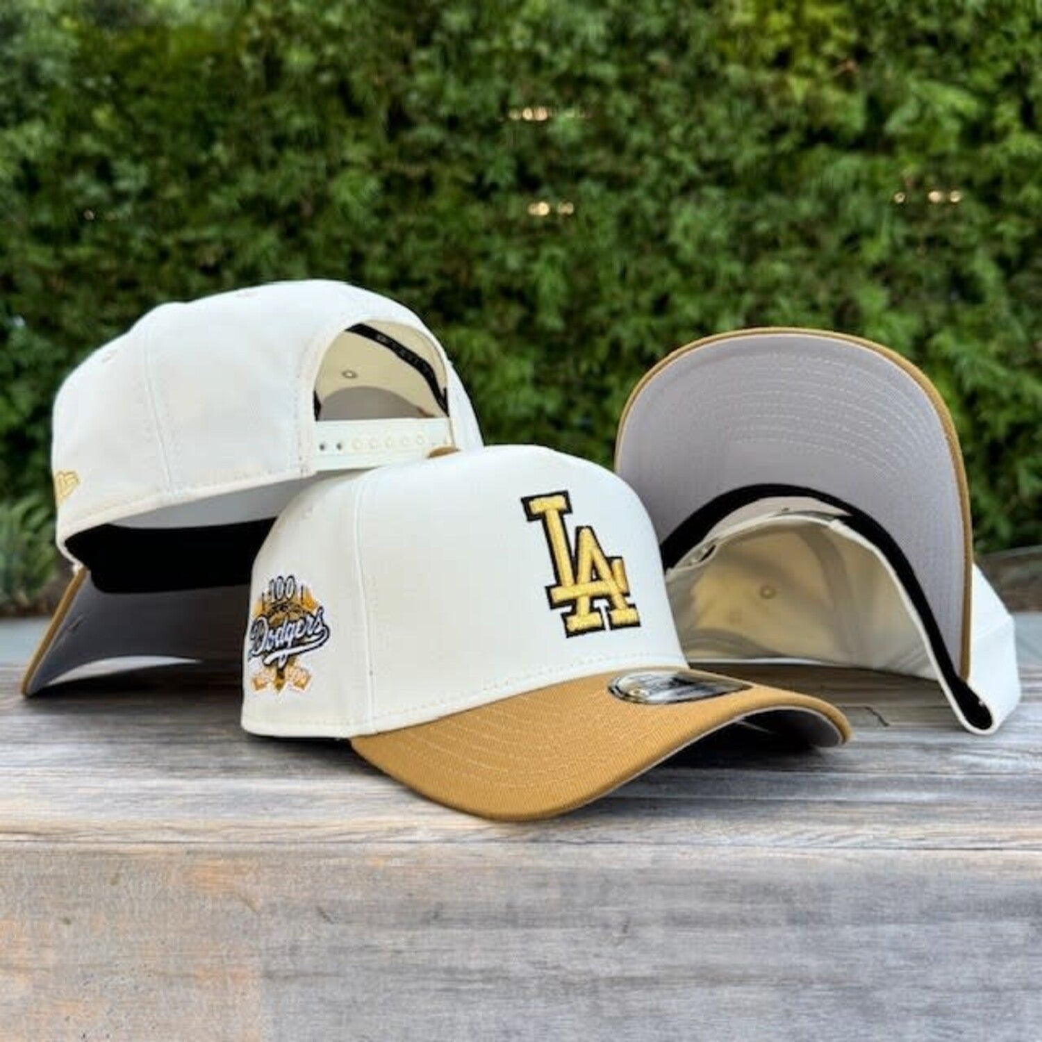 New Era 9FORTY A-Frame Los Angeles Dodgers 100th Anniversary cap features an ivory crown and a gold visor