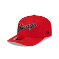 red Chicago Bulls Hardwood Classics 9SEVENTY stretch-snap hat features a black "Chicago" script embroidery on the front.