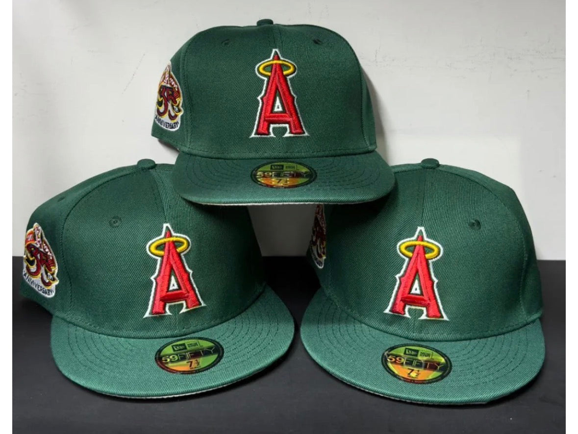 green New Era 59Fifty Los Angeles Angels fitted cap featuring a 25th anniversary patch on the side.