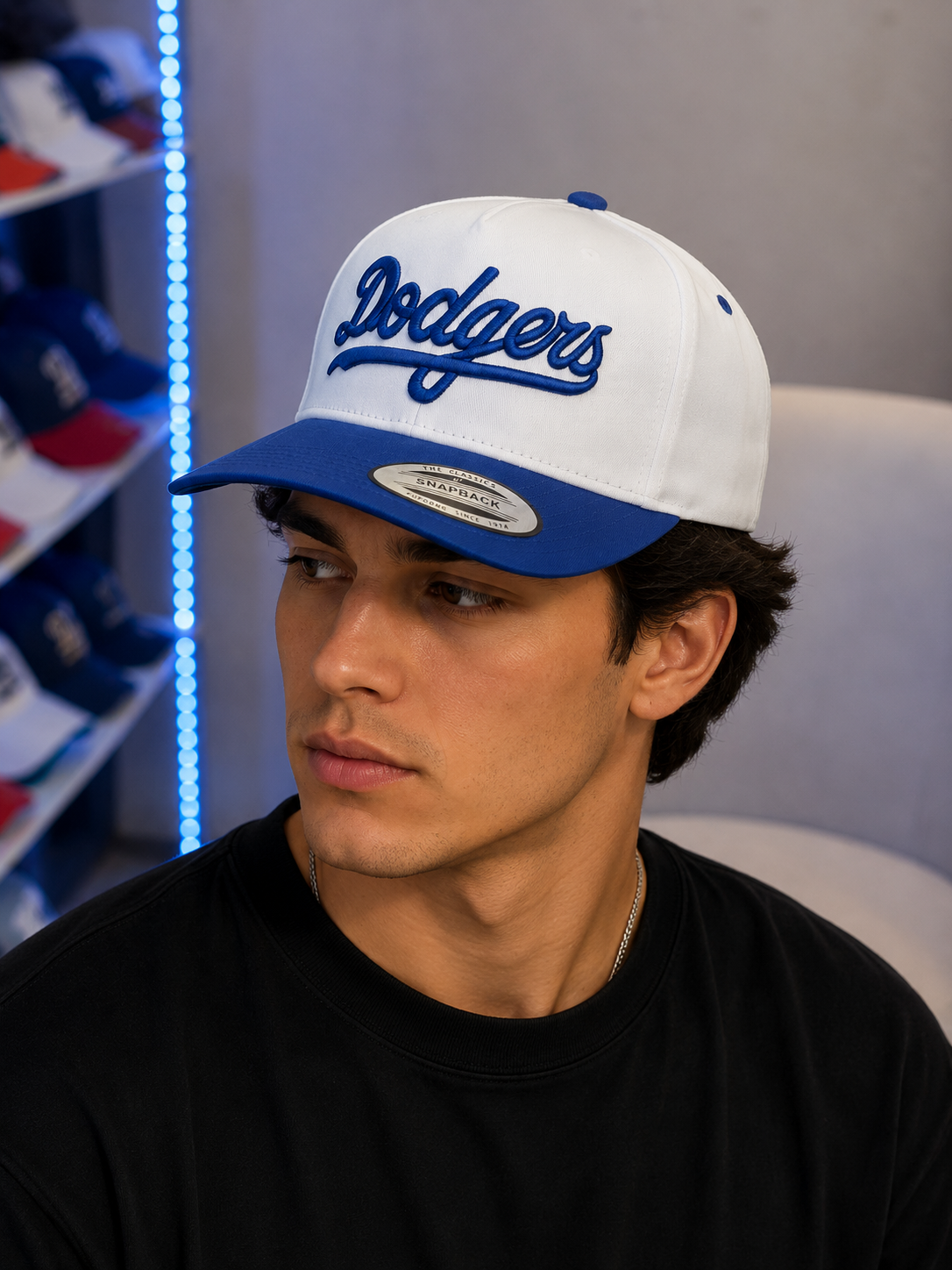 white and blue Mitchell & Ness Los Angeles Dodgers Cooperstown Collection Evergreen snapback features a structured crown and embroidered script logo