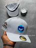 light gray Chicago Cubs New Era 59FIFTY fitted cap features a prominent blue bear logo patch on the front and a commemorative patch for a past All-Star game on the side.