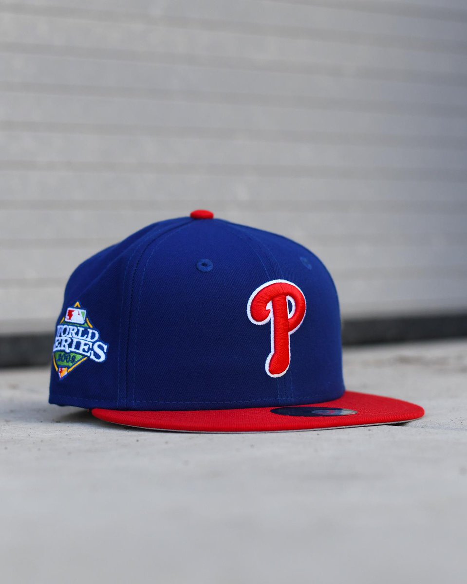 New Era Philadelphia Phillies 2009 World Series fitted hat featuring a royal blue crown and red brim