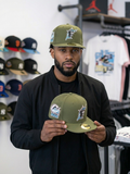 New Era Florida Marlins 10th Anniversary Cooperstown Collection 59FIFTY fitted hat in olive green.