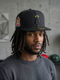 New Era Los Angeles Angels 59FIFTY fitted hat features a black crown with a gold-accented halo over the 'A' logo.