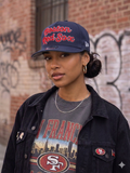 navy New Era Boston Red Sox wordmark 9FIFTY snapback hat features prominent red embroidered script text.
