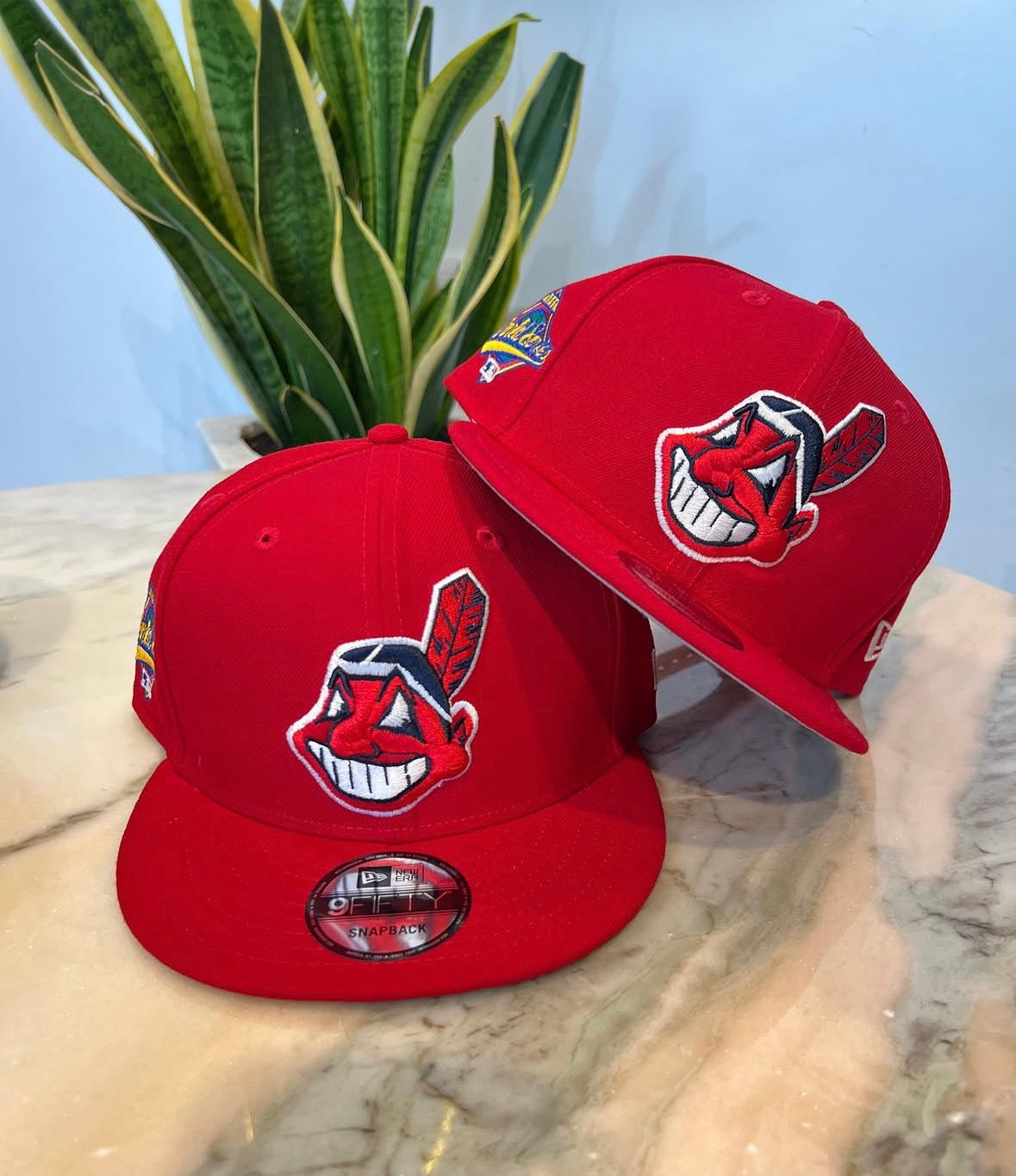 New Era 59Fifty fitted cap featuring the classic Cleveland Indians Chief Wahoo logo and a 1995 World Series patch