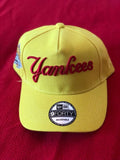Bright yellow New Era New York Yankees 9FORTY A-Frame snapback cap featuring a "Yankees" script logo on the front and a 1999 World Series side patch.