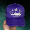 Corteiz purple Alcatraz trucker hat. 