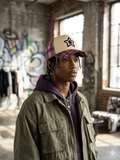 Star Team plaid and star graphic trucker hat, similar to styles recently available from brands like Star Team