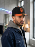 New Era 59FIFTY San Francisco Giants hat features a distinct orange brim and a classic embroidered team logo.