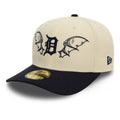 New Era Detroit Tigers "Team Wings" 59FIFTY fitted cap features a light beige structured crown with navy embroidered bat wings flanking the team logo