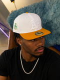 New Era Oakland Athletics 59Fifty fitted cap featuring a white crown and a gold visor.