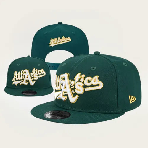 green New Era 9FIFTY snapback hat featuring an embroidered "Athletics" script logo in white and yellow