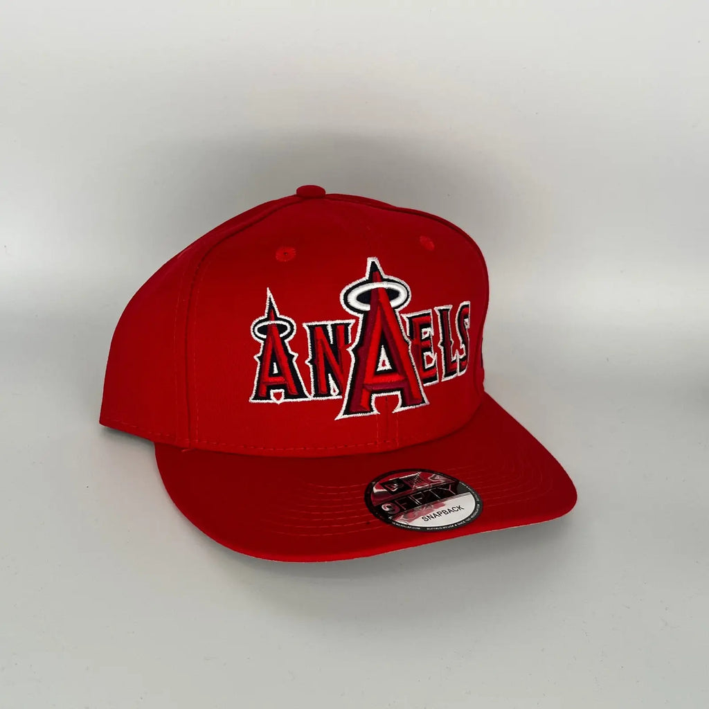 New Era Anaheim Angels "Overlap" snapback hat features a controversial design where the team name reads as "ANAELS" due to overlapping letters